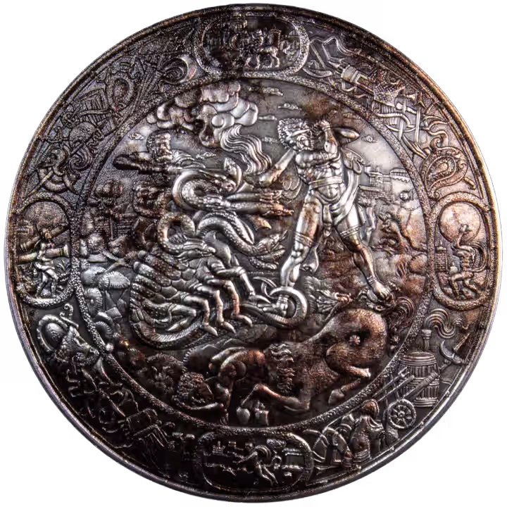 Shield of Hercules silver stacker with an engraved battle scene